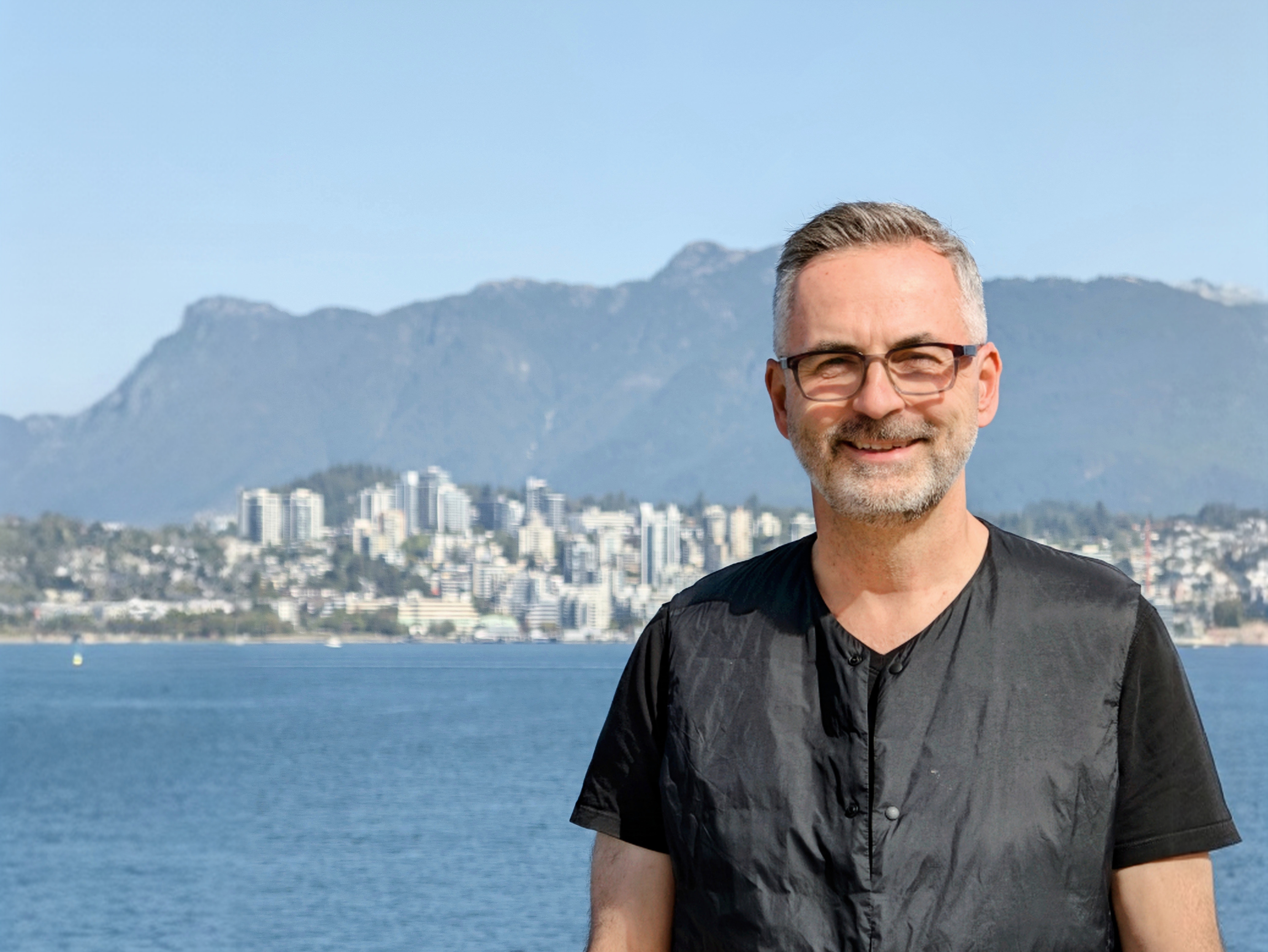 Dave Kurvers overlooking the City of North Vancouver and the North Shore mountains
